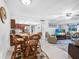 Open-concept living space with kitchen, dining area, and living room at 2300 Aaron St # 106, Port Charlotte, FL 33952