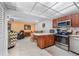 Bright living space with a modern kitchen and open floor plan at 2300 Aaron St # 106, Port Charlotte, FL 33952