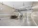 Spacious lobby featuring high ceilings, tile floors, decorative lighting, and a cozy seating area, enhancing the welcoming ambiance at 2300 Aaron St # 106, Port Charlotte, FL 33952