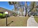 A charming patio with stone pavers provides an outdoor sitting area with views of the community at 2300 Aaron St # 106, Port Charlotte, FL 33952