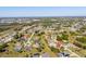 An overhead shot displaying homes in a planned community with nearby amenities and beautiful natural surroundings at 25199 Chiclayo Ave, Punta Gorda, FL 33983