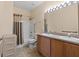 Functional bathroom featuring a double sink vanity and tub-shower combo at 25199 Chiclayo Ave, Punta Gorda, FL 33983