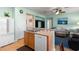 Bright kitchen offering laminate counters and seamlessly flowing into the living area at 25199 Chiclayo Ave, Punta Gorda, FL 33983