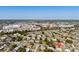 Aerial view of home in a vibrant neighborhood close to the water and town at 3124 Crestwood Dr, Port Charlotte, FL 33952