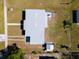 Birds-eye view of the house, its fenced yard, and a convenient storage shed at 3124 Crestwood Dr, Port Charlotte, FL 33952