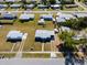High angle aerial view displays this house's layout within the surrounding community at 3124 Crestwood Dr, Port Charlotte, FL 33952