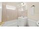 Clean bathroom with a shower-tub combo and a vanity with sink at 3124 Crestwood Dr, Port Charlotte, FL 33952