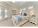 Cozy bedroom with a queen-sized bed, soft colors, and bright natural light at 333 Santander Ct, Punta Gorda, FL 33950