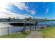 Private boat dock with lift for easy access to the water, ideal for boating and water activities at 333 Santander Ct, Punta Gorda, FL 33950