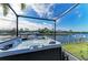 Relaxing hot tub with scenic waterfront views, creating a peaceful retreat at 333 Santander Ct, Punta Gorda, FL 33950