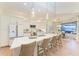 Modern kitchen with a large center island, stainless steel appliances, and pendant lighting at 333 Santander Ct, Punta Gorda, FL 33950
