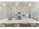Bright kitchen featuring a large island, stainless steel appliances, and modern finishes at 333 Santander Ct, Punta Gorda, FL 33950