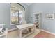 Bright home office featuring a large window, a work desk, and modern decor at 333 Santander Ct, Punta Gorda, FL 33950
