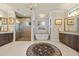 Luxurious primary bath featuring dual vanities, a soaking tub, and a walk-in shower at 3335 Grenada Ct, Punta Gorda, FL 33950
