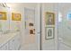 Bright bathroom features a glass shower and granite countertops, with an open doorway to the living room at 3335 Grenada Ct, Punta Gorda, FL 33950