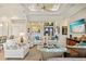 Well-decorated living room with plush seating, modern decor, and an open concept design at 3335 Grenada Ct, Punta Gorda, FL 33950