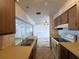 Functional kitchen featuring essential appliances and a double basin sink at 410 Hinton St, Port Charlotte, FL 33954