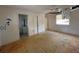 Main bedroom featuring ceiling damage and closet space at 410 Hinton St, Port Charlotte, FL 33954