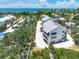 Gorgeous aerial view of the white condominium homes near the tropical beach at 5031 N Beach Rd # C-124, Englewood, FL 34223