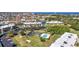 Wonderful aerial view of condos, lush landscaping, and a sparkling community pool at 601 Shreve St # 36C, Punta Gorda, FL 33950