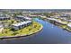 Waterfront condos with lush landscaping, palm trees, and serene water views at 601 Shreve St # 36C, Punta Gorda, FL 33950