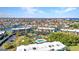 Excellent aerial view of condos, lush landscaping, and a sparkling community pool at 601 Shreve St # 36C, Punta Gorda, FL 33950