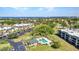 Gorgeous aerial view of condos, a pool, and stunning water views at 601 Shreve St # 36C, Punta Gorda, FL 33950