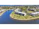 Waterfront condos with lush landscaping, palm trees, a pool and stunning water views at 601 Shreve St # 36C, Punta Gorda, FL 33950