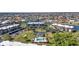 Extensive aerial view of a condo complex with a pool, carport parking and surrounding canals at 601 Shreve St # 36C, Punta Gorda, FL 33950