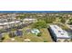 Amazing aerial view of waterfront condos, a sparking pool, and meticulously maintained landscaping at 601 Shreve St # 36C, Punta Gorda, FL 33950