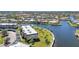 Condominium building features waterfront access, mature landscaping, and convenient parking at 601 Shreve St # 36C, Punta Gorda, FL 33950