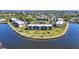 Waterfront condos with lush landscaping, palm trees, a pool and stunning water views at 601 Shreve St # 36C, Punta Gorda, FL 33950