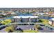 Waterfront condominium complex featuring covered parking, mature landscaping, and community canal access at 601 Shreve St # 36C, Punta Gorda, FL 33950