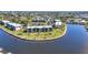 Scenic aerial view of waterfront condo buildings with beautifully landscaped grounds and access to the water at 601 Shreve St # 36C, Punta Gorda, FL 33950