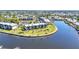 Waterfront condos with lush landscaping, palm trees, a pool and stunning water views at 601 Shreve St # 36C, Punta Gorda, FL 33950