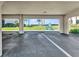 Assigned carport parking with serene green views, enhancing convenience and natural beauty at 601 Shreve St # 36C, Punta Gorda, FL 33950