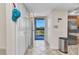 Welcoming condo entrance features tile flooring, ample closet space and a bright view of the outdoors at 601 Shreve St # 36C, Punta Gorda, FL 33950