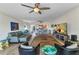 Open-concept living space featuring comfortable seating, a dining area, and access to the lanai at 601 Shreve St # 36C, Punta Gorda, FL 33950