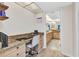 Office space featuring a granite desk top and view of a bathroom with granite countertops at 601 Shreve St # 36C, Punta Gorda, FL 33950