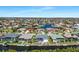 Community aerial view of waterfront homes, canals, and well-maintained lawns at 609 Macedonia Dr, Punta Gorda, FL 33950
