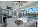 Outdoor lanai featuring a sitting area, a grill, and a pool at 609 Macedonia Dr, Punta Gorda, FL 33950
