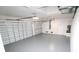 Spacious two-car garage with two doors, overhead lighting, and ample room for storage at 9529 Calumet Blvd, Port Charlotte, FL 33981