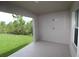 Covered lanai overlooking the lawn, perfect for outdoor entertaining with a view of nature at 9529 Calumet Blvd, Port Charlotte, FL 33981