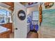 Unique bathroom with nautical decor, custom painting, and a fun beachy theme, adding character and charm at 1068 Harbour Cape Pl, Punta Gorda, FL 33983