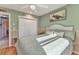 Cozy bedroom with a large bed, soft lighting, and calming colors, making it perfect for rest and relaxation at 1068 Harbour Cape Pl, Punta Gorda, FL 33983