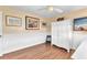 Bright bedroom with white wainscoting and stylish furnishings at 1068 Harbour Cape Pl, Punta Gorda, FL 33983