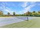 Come enjoy a match in this outdoor tennis court with a great view of the community at 1068 Harbour Cape Pl, Punta Gorda, FL 33983