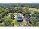 A gorgeous aerial view of the property has surrounding trees and neighbors at 14289 Manatee Rd, Parrish, FL 34219