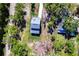 Birds eye view of home has mature trees and close proximity to neighbors at 14289 Manatee Rd, Parrish, FL 34219