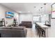 Open-concept living area with modern furnishings, laminate floors, and an inviting atmosphere at 14289 Manatee Rd, Parrish, FL 34219